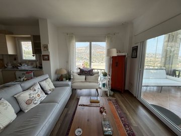 A Sea & Nature View Apartment In Bodrum For Sale - View from lounge to the balcony