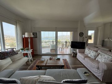 A Sea & Nature View Apartment In Bodrum For Sale - Spacious lounge and balcony
