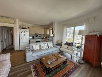 A Sea & Nature View Apartment In Bodrum For Sale - Lounge to the kitchen