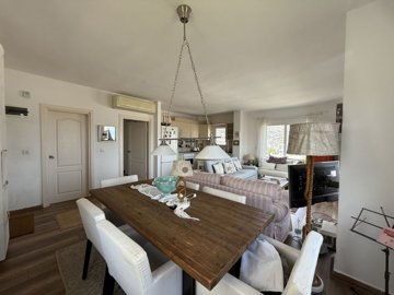 A Sea & Nature View Apartment In Bodrum For Sale - Dining area to the kitchen