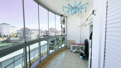 Immaculate Investment Property For Sale In Alanya - Large enclosed balcony