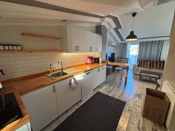 Duplex Apartment For Sale In Hisar, Didim - From the kitchen to the lounge