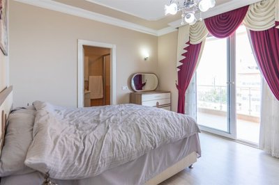 Immaculate Seafront Apartment in Mahmutlar, Alanya For Sale - Master bedroom with large balcony