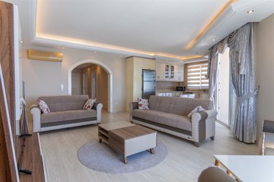 Immaculate Seafront Apartment in Mahmutlar, Alanya For Sale - Lounge to the kitchen