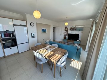 Sea View Apartment For Sale In Akbuk, Didim - Dining area through to the lounge