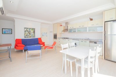 Impressive Sea View Apartment In Cikcilli, Alanya For Sale - Kitchen and lounge