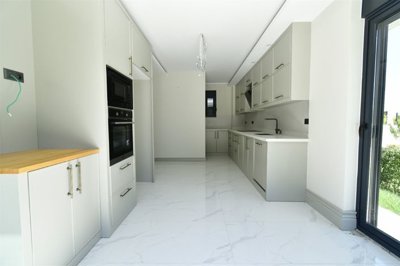 Upscale Property For Sale In Manavgat, Antalya - Kitchen with garden access