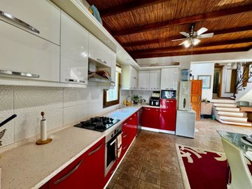 Idyllic Detached Villa In Uzumlu, Fethiye For Sale - Kitchen with beamed ceiling