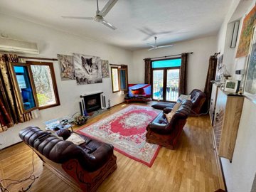 Idyllic Detached Villa In Uzumlu, Fethiye For Sale - Living room with a fireplace