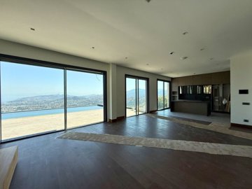 Exceptional Villa With An Infinity Pool & Sea Views For Sale In Bodrum - Lounge to the open-plan kitchen