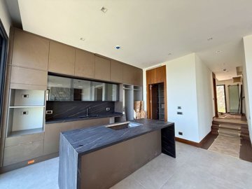Exceptional Villa With An Infinity Pool & Sea Views For Sale In Bodrum - Open-plan living space and kitchen