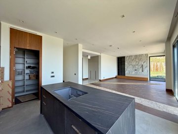 Exceptional Villa With An Infinity Pool & Sea Views For Sale In Bodrum - From the kitchen to the lounge