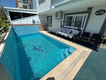 Fully Furnished Semi-Detached Villa For Sale In Didim – Seating area next to the pool