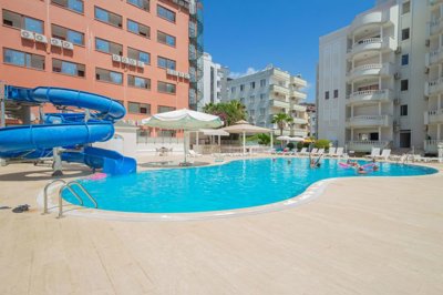 Flawless Two-Bedroom Apartment For Sale In Oba, Alanya – Communal swimming pool