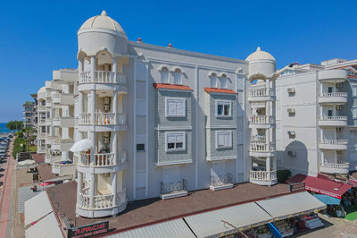 Flawless Two-Bedroom Apartment For Sale In Oba, Alanya – Modern apartment block