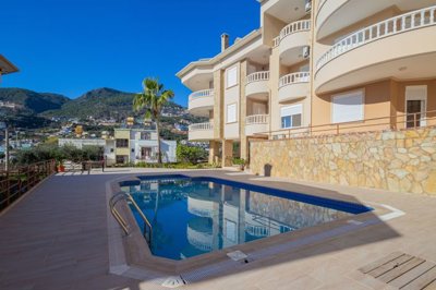Exceptional Alanya Property For Sale In Tepe - Main view of the shared pool and terraces