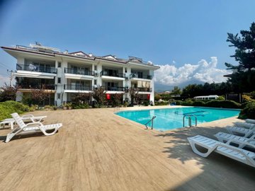 Sea View Fethiye Apartment For Sale Near The Promenade - Huge social sunbathing terraces