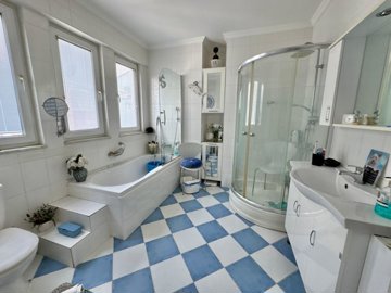 Sea View Fethiye Apartment For Sale Near The Promenade - Ensuite with a bathtub