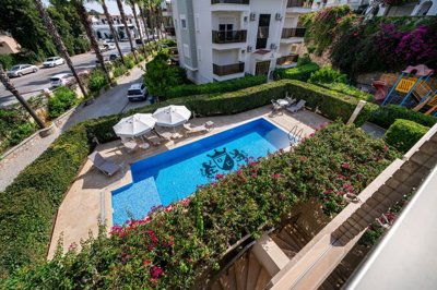 Exceptional Fully Furnished Penthouse For Sale In Alanya - Balcony views over the pool