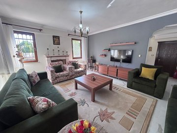 Attractive Detached Property For Sale In Dalyan, Mugla - Beautifully furnished lounge with fireplace