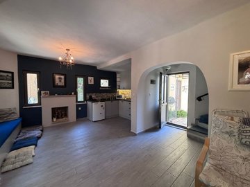 A Traditional Garden Apartment With Modern Accents Is For Sale In Dalyan - Entrance into the open-plan living space