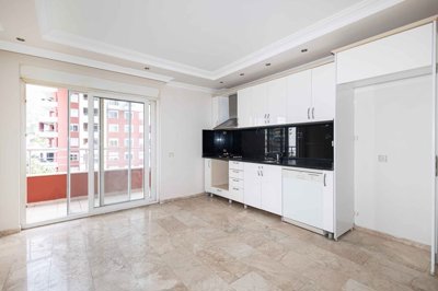 Notable Alanya Apartment For Sale In Cikcilli - Kitchen and out to balcony