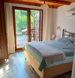 Nature Bungalow For Sale With A Private Pool & Annex In Kadikoy, Fethiye - Bedroom with terrace access