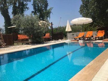Nature Bungalow For Sale With A Private Pool & Annex In Kadikoy, Fethiye - Pool and sunbathing terraces