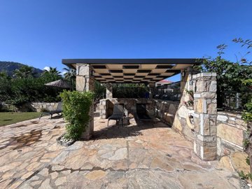Charming Villa For Sale In Dalyan With A Private Pool & Garden - Shaded seating by the pool