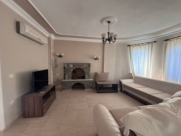 Detached Dalaman Property For Sale In Scenic Akkaya Valley - Lounge with a fireplace
