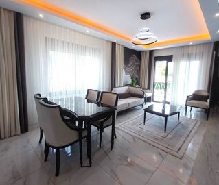 Exceptional Two-Storey Furnished Apartment In Alanya For Sale In Avsallar - From the kitchen to the lounge