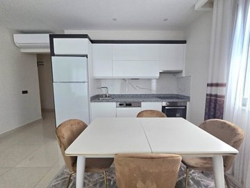 Pristine Apartment For Sale In Alanya - Dining area & fully fitted kitchen