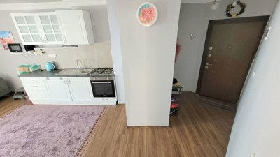 Notable Alanya Property For Sale in Mahmutlar - Entrance and kitchen