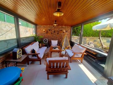 Luxury Three-Storey Villa In Kusadasi For Sale - Seating area in the winter garden