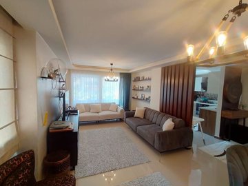 Luxury Three-Storey Villa In Kusadasi For Sale - Lounge and semi open-plan kitchen