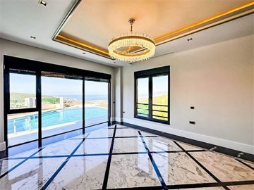 Ultra-Modern Smart Home Property For Sale In Alanya - Living area with pool access