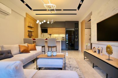 Stylish Apartments In Kusadasi For Sale With On-Site Facilities - Lounge to the kitchen