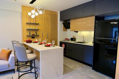 Stylish Apartments In Kusadasi For Sale With On-Site Facilities - Kitchen with breakfast bar