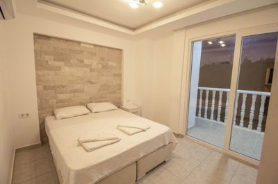 An Exquisite Fethiye Property For Sale With Nature Views – Bedroom with balcony