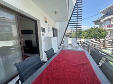 Delightful Riverside Apartment For Sale In Dalyan - Alfresco dining next to the swim-up pool