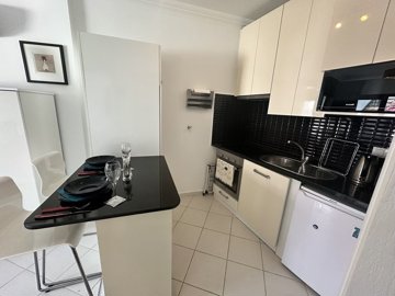 Delightful Riverside Apartment For Sale In Dalyan - Kitchen with handy breakfast bar