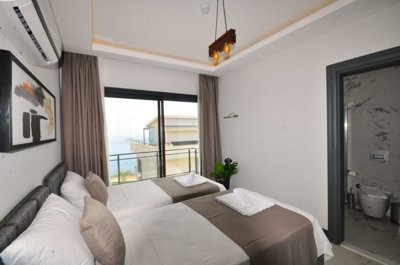 Newly-Built Property Investment In Kalkan - Bedroom with sea views and ensuite