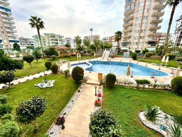 Alanya Apartment For Sale 300m From The Beach In Mahmutlar – Shared pool with sunbathing terrace