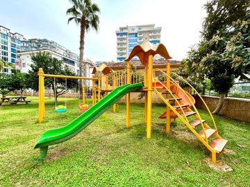 Alanya Apartment For Sale 300m From The Beach In Mahmutlar – Children's play area