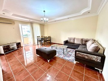 Alanya Apartment For Sale 300m From The Beach In Mahmutlar – Spacious lounge with balcony