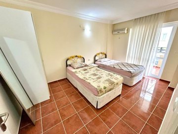 Alanya Apartment For Sale 300m From The Beach In Mahmutlar – Second bedroom with a balcony