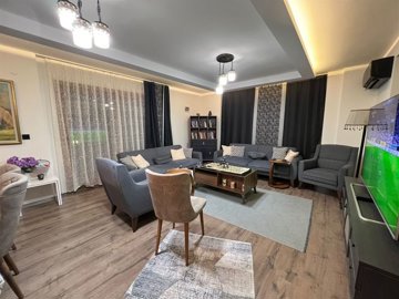 Immaculate Apartment In Kusadasi For Sale With A Shared Pool - Kitchen to the lounge