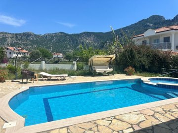 A Pretty Dormer Bungalow For Sale In Dalyan - Pool and sunbathing terraces