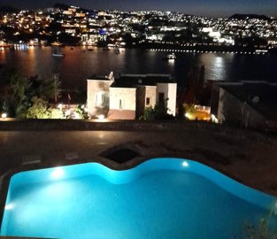 Sea View Apartment In Bodrum For Sale - Glistening lights at night