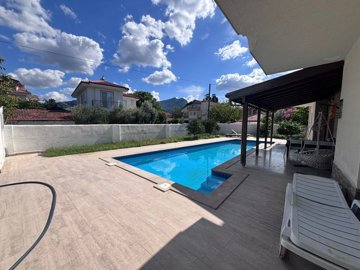 Refreshing Villa For Sale In Picturesque Dalyan - Sunbathing terrace around the pool